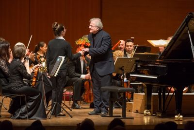 Manny Ax receiving flowers from usher in Istanbul, 9:35pm, 5/4/13. Photo by Chris Lee Photo