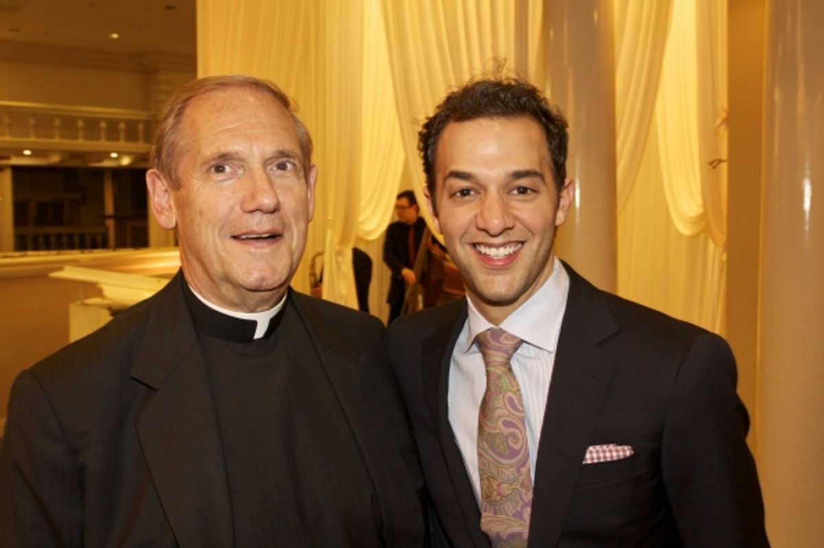 Monsignor Kenneth Velo and Kyle DeSantis at 