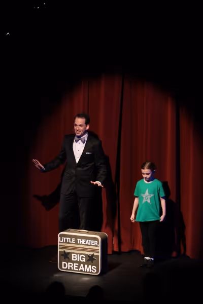  David Rossetti (host) & Katie Borrel (West Side Y''s Kids Company member) start the  Photo