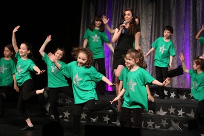 Desi Oakley & the West Side Y''s Kids Company sing ''Bushel & a Peck'' Photo