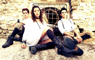 L to R: Trevor Chauvin, Mariela Flor Olivo, and Travis Trevino in SPRING AWAKENING. Photo