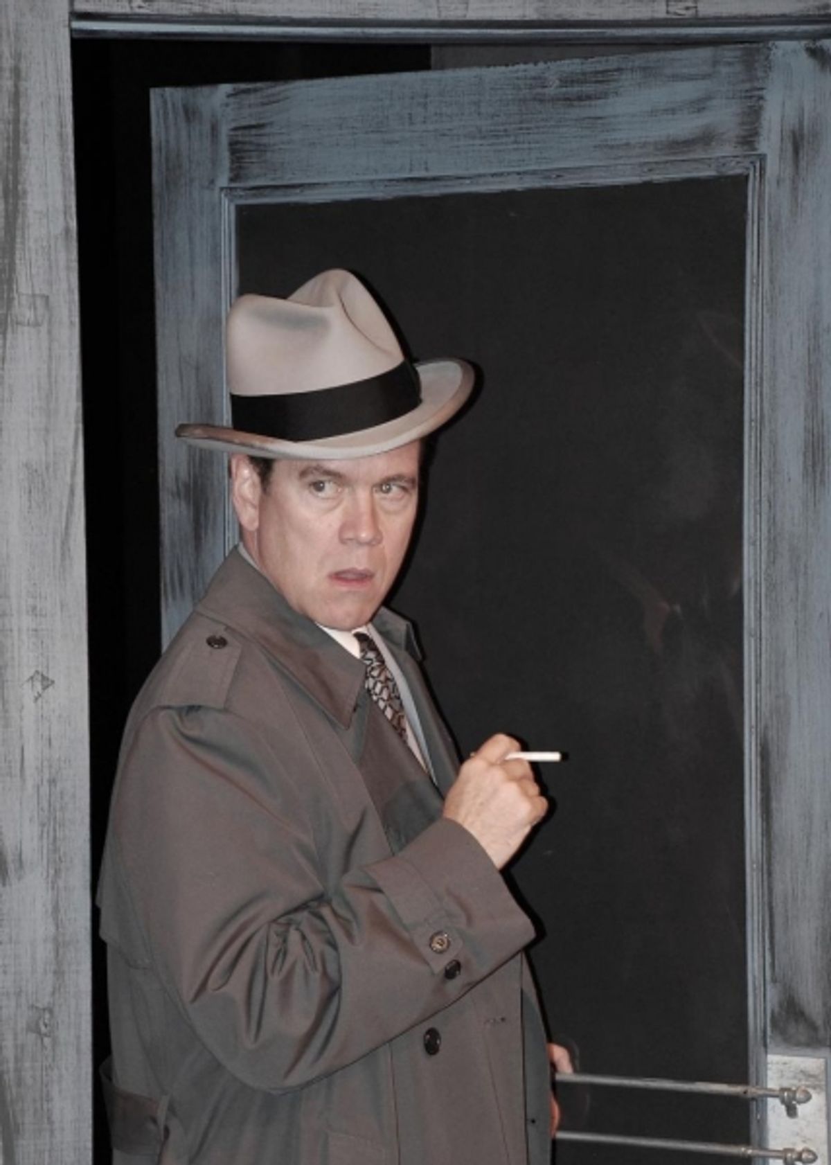 Mark Kamish portrays gumshoe detective Stone at 