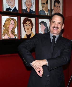 Tom Hanks with wife Rita Wilson caricature behind him @ BroadwayWorld Tom Hanks with wife Rita Wilson caricature behind him Photo