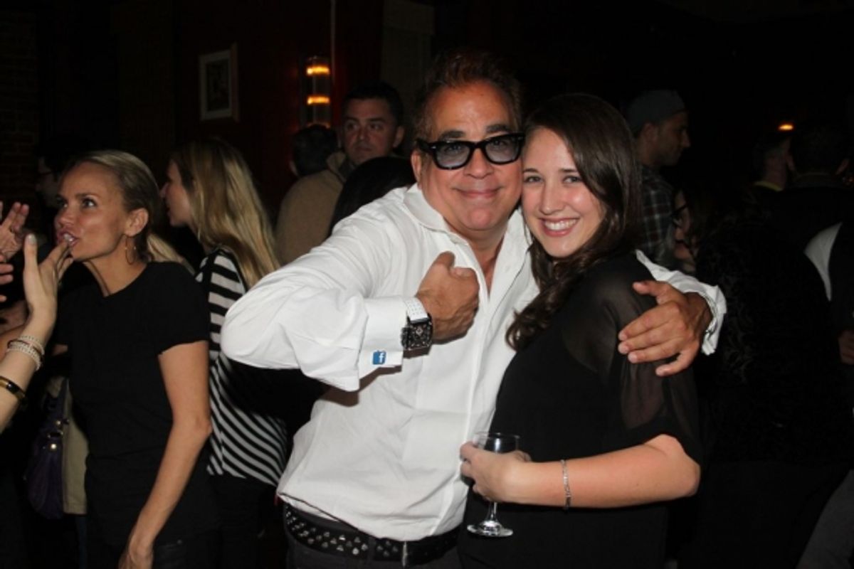 Richard Jay-Alexander showing off his new ''Facebook'' cufflinks from assistant Amy Shaughnessy  at 