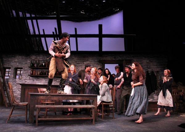 The townspeople celebrate Christy, played by Michael A. Newcomer, who has triumphed i Photo
