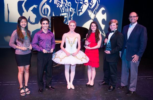MCC Governing Board Chair Kevin Dent (on far right) with first-place winners of the 2 Photo