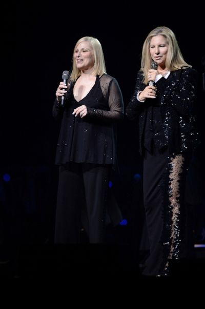 Barbra Streisand performs on stage with her sister Roslyn Kind
 Photo