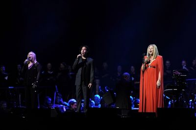 Barbra Streisand performs with her sister  Roslyn Kind and son Jason Gould
 Photo