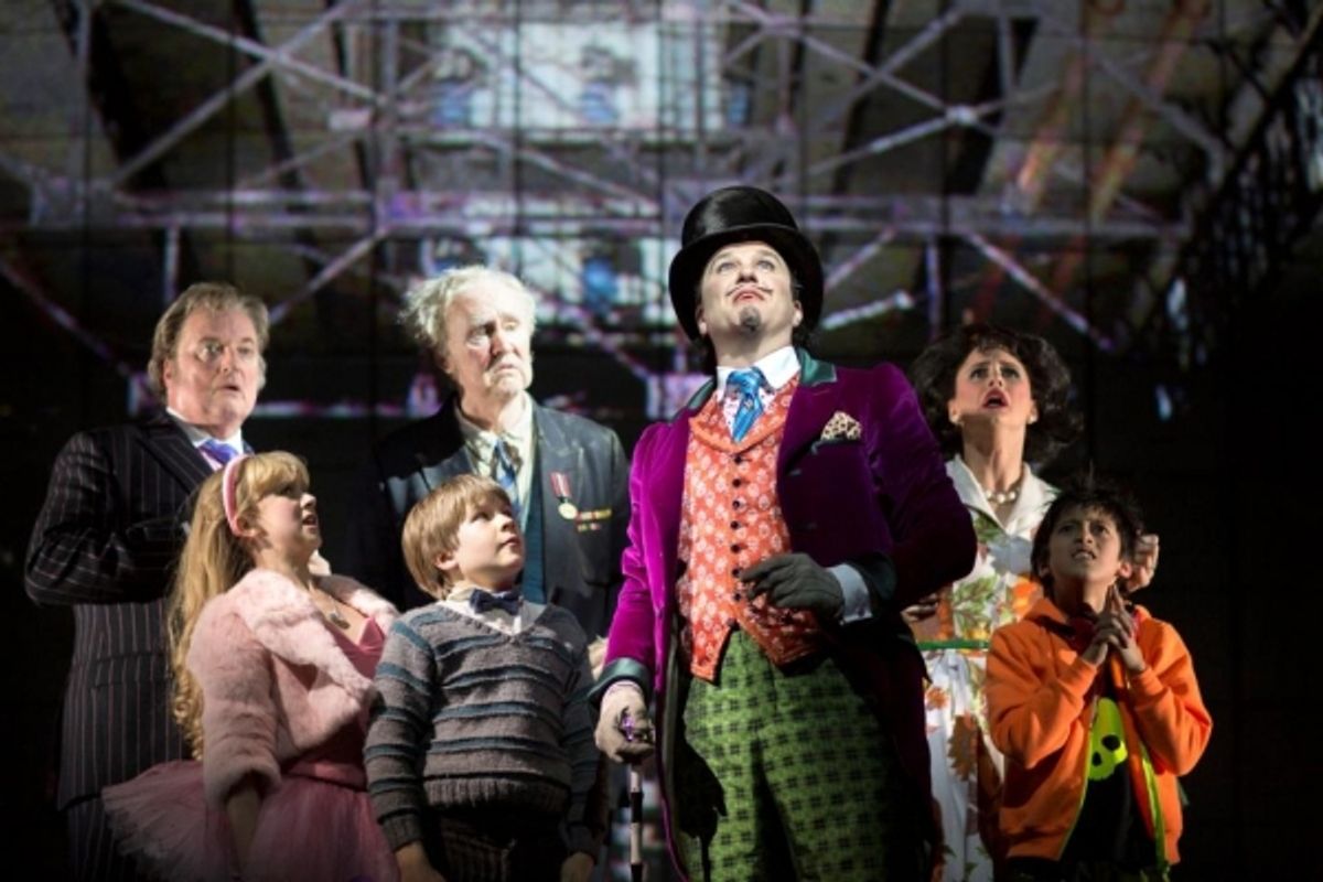 Douglas Hodge as Willy Wonka with Jack Costello as Charlie and cast members at 
