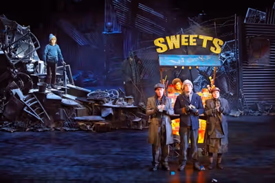 Jack Costello as Charlie, and members of the cast Photo