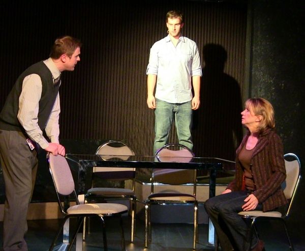 Dr. Madden (played by Richard Payton) is watched by Gabe (Nathan Larkins) as the doct Photo