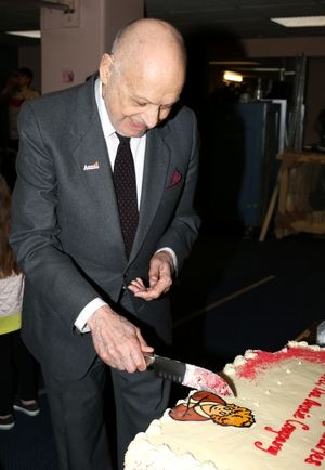 Charles Strouse cuts into the ''Annie'' Logo requested by his grandaughter @ BroadwayWorld Charles Strouse cuts into the ''Annie'' Logo requested by his grandaughter Photo