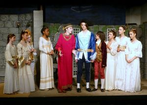 Canard (Trevor Hart, in red), King Confort (Osric Holt) and Ladies in Waiting (from left Melana Dix, Tyler Cable, TaiJonna Boone, HanaLina Woolley, Avalon Silver, and Emilia Zielinski) do their best to keep Paysanne (Anthony Olivas, center) from leaving t @ BroadwayWorld Canard (Trevor Hart, in red), King Confort (Osric Holt) and Ladies in Waiting (from l Photo