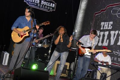 The Adrianna Freeman Band perform at the Silver Dollar Saloon. L-R: Zach Torres (acou Photo