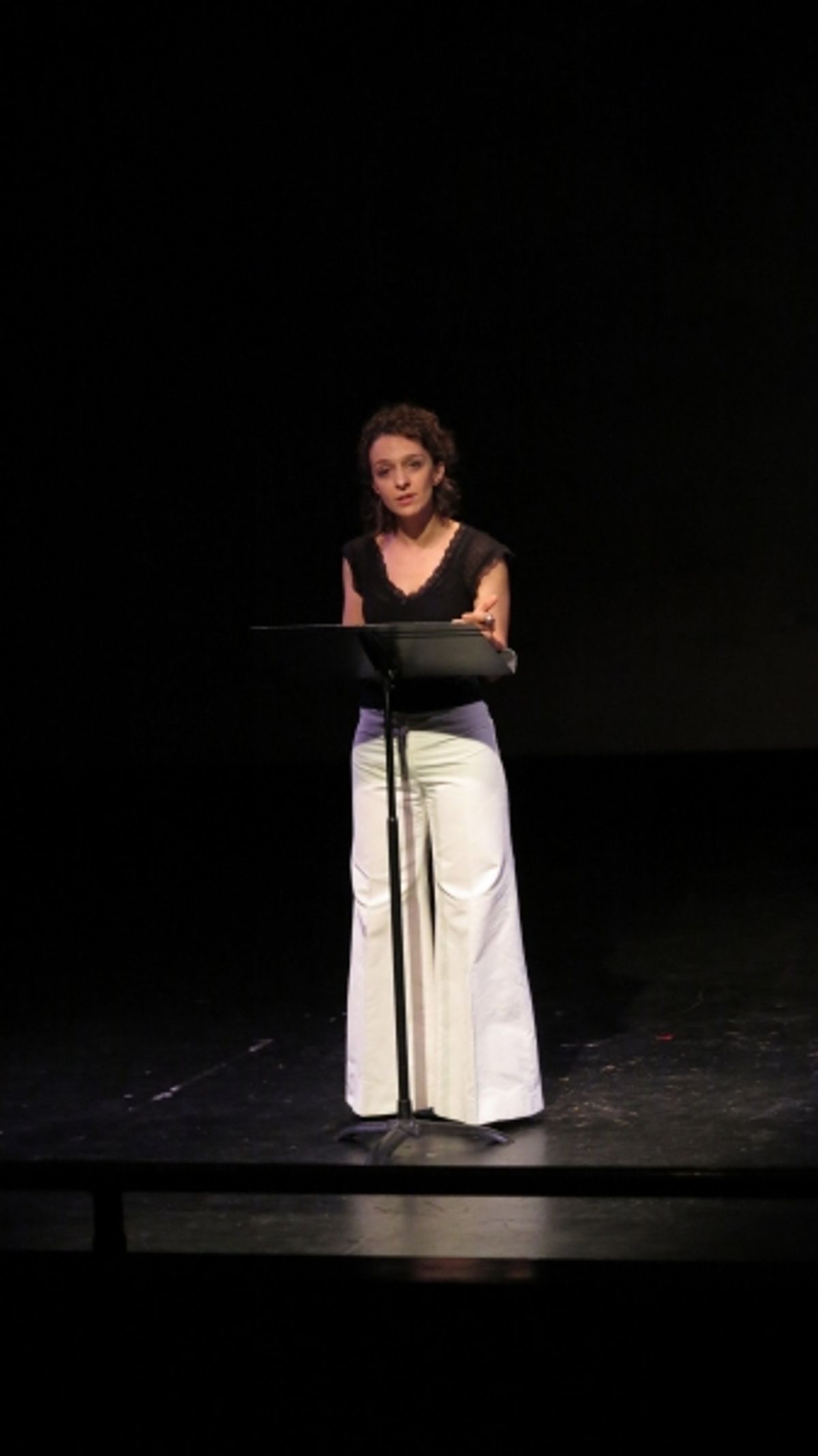 Cristina Spina reads an excerpt from ''Una Madre'' in a tribute to recently deceased playwright Franca Rame. at 