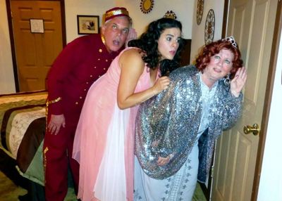 ''Do you hear anything,'' Maggie asks Julia as the Bellhop strains to hear too! (from Photo