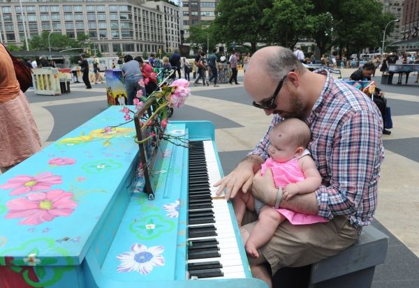 Seth Johnson and his daughter Phoebe, enjoy Father''s Day by playing one of the 88 Si Photo