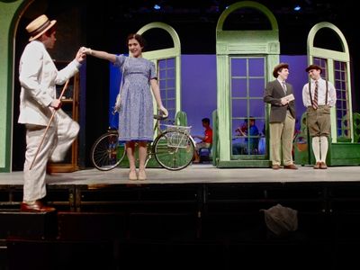 Smooth-talker Steven Kodaly (Kenny Francoeur) seduces a smiling Ms. Ritter (Katrina M Photo