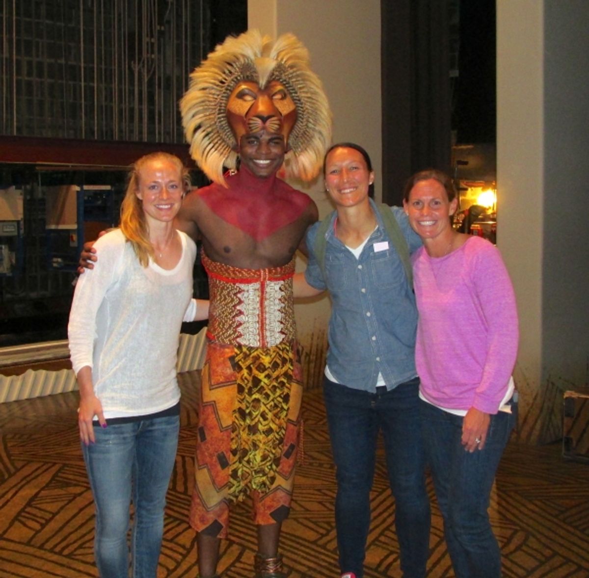 Andile Gumbi (Simba) with Becky Sauerbrunn, Jill Loyden and Christie Rampone at 