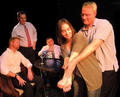 Luisa (Stefani Patch) gets a golf lesson from Brandt (Lance Stodghill) while Hector(J Photo