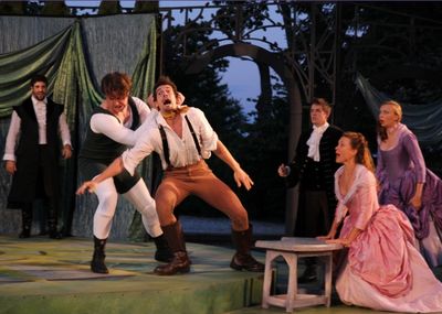 (front, center) Benjamin Stirling as Charles, a champion wrestler takes on Orlando pl Photo