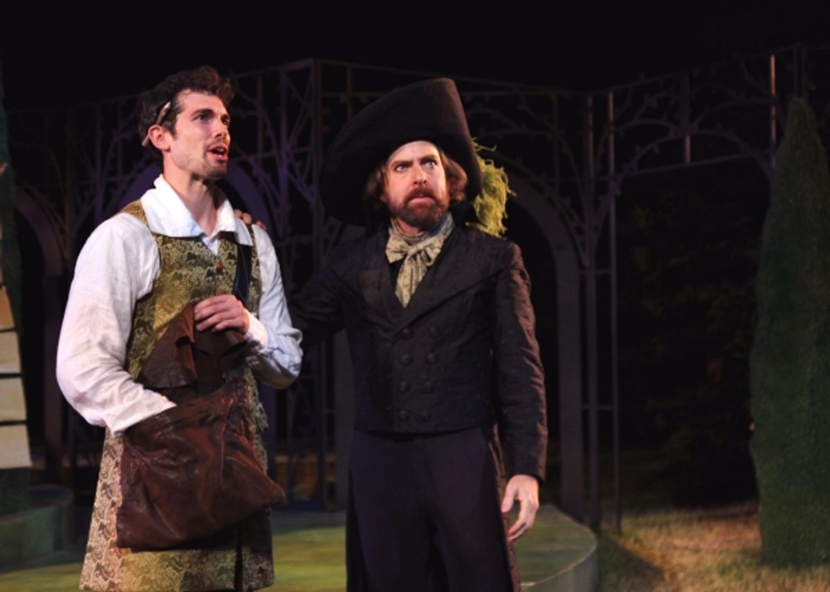 Orlando, played by Matthew Simpson, meets the melancholy Jaques in the Forest of Arden.  at 