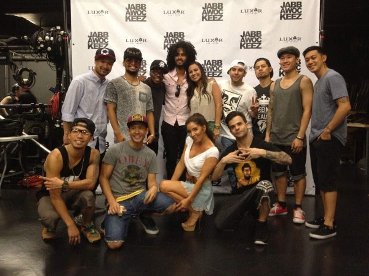 Comedian Anjelah Johnson backstage with the Jabbawockeez cast at 