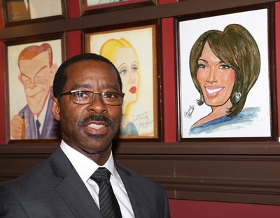 Courtney B. Vance, pictured next to a caricature of wife Angela Bassett Photo