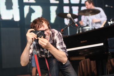 Photo by Steve DeWeese. Ben Folds snaps a photo from stage during a July 5 concert at Photo