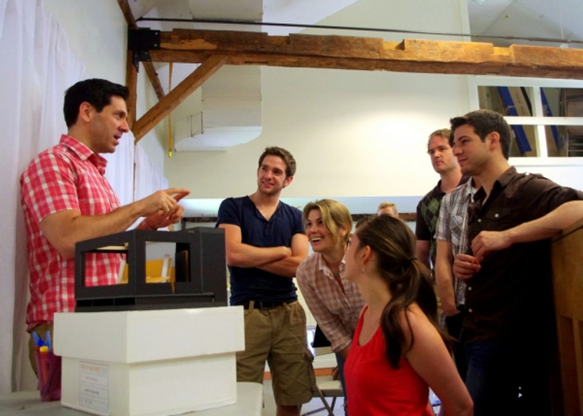 Director Michael Berresse reviews Set Designer Tim Mackabee''s set model with the cast of Next to Normal  at 