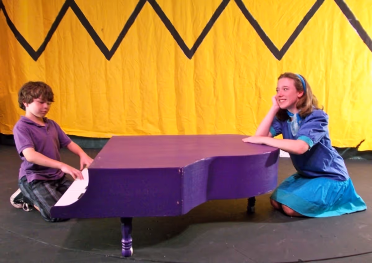 R.J. Harkin as Schroeder and Jillian Kirlin as Lucy at  Kids' YOU'RE A GOOD MAN, CHARLIE BROWN