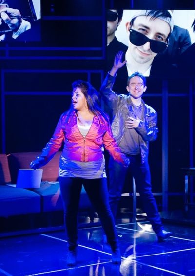 Makalo (Carolyn Cole) and Evan (James Gardiner) rehearse a song for national televisi Photo
