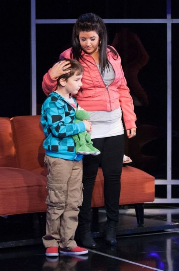 Son Jesse (Holden Browne, left) and mother Makalo (Carolyn Cole) keep each other stro Photo