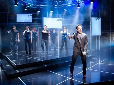 Former pop star Evan Peterson (James Gardiner) hosts the reality television show Idol Photo
