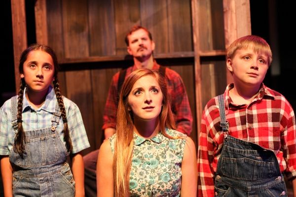 Edward MacLennan with (front, left to right) India Rose Renteria, Haley Jane Schafer  Photo