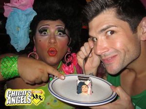 Kay Sedia with Kevin McNamara ''Buck Nekid''  checking out the Kay Sedia''s cake face Photo