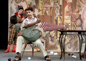 Mistaking him for her husband, Lanise Antoine Shelley as Adriana seduces Paul Hurley as Antipholus of Syracuse while Sam Taylor, as his confused servant Dromio of Syracuse, looks on @ BroadwayWorld Mistaking him for her husband, Lanise Antoine Shelley as Adriana seduces Paul Hurley Photo