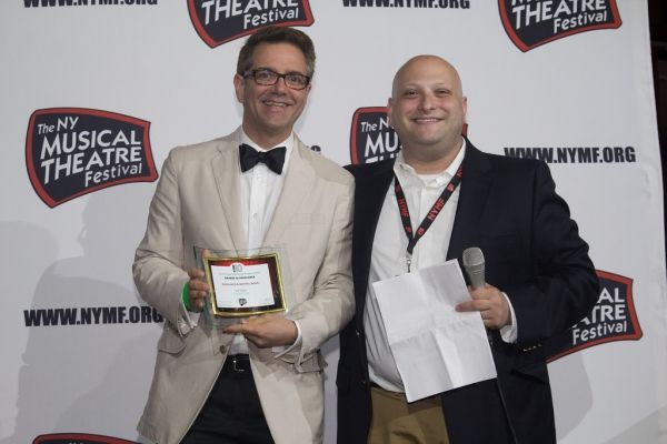 Zach Blane (Lighting Designer) accepts the Excellence in Design Award on behalf of Th Photo