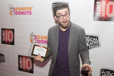 Jacob Porter, Producer Julian Po accepts on behalf of  Ira Antelis (Composer) for Exc Photo