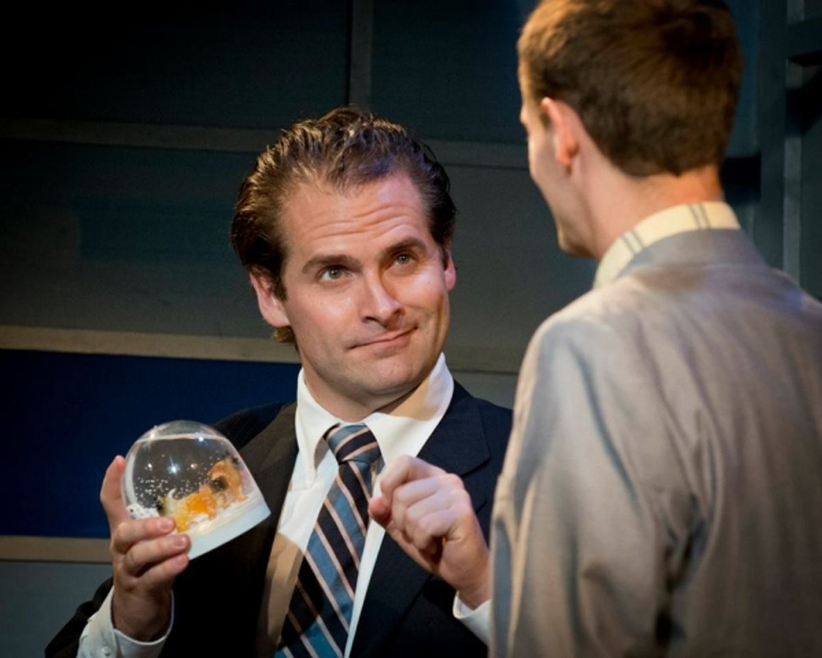 Larry (John E. Elliot), Frank'Â­s boss at the humane society, displays his fancy canine snow globe at 