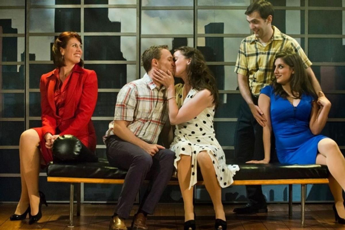 The group joyfully looks on as Frank (Danny Gardner) and Abby (Patricia Noonan) share a sweet kiss at 