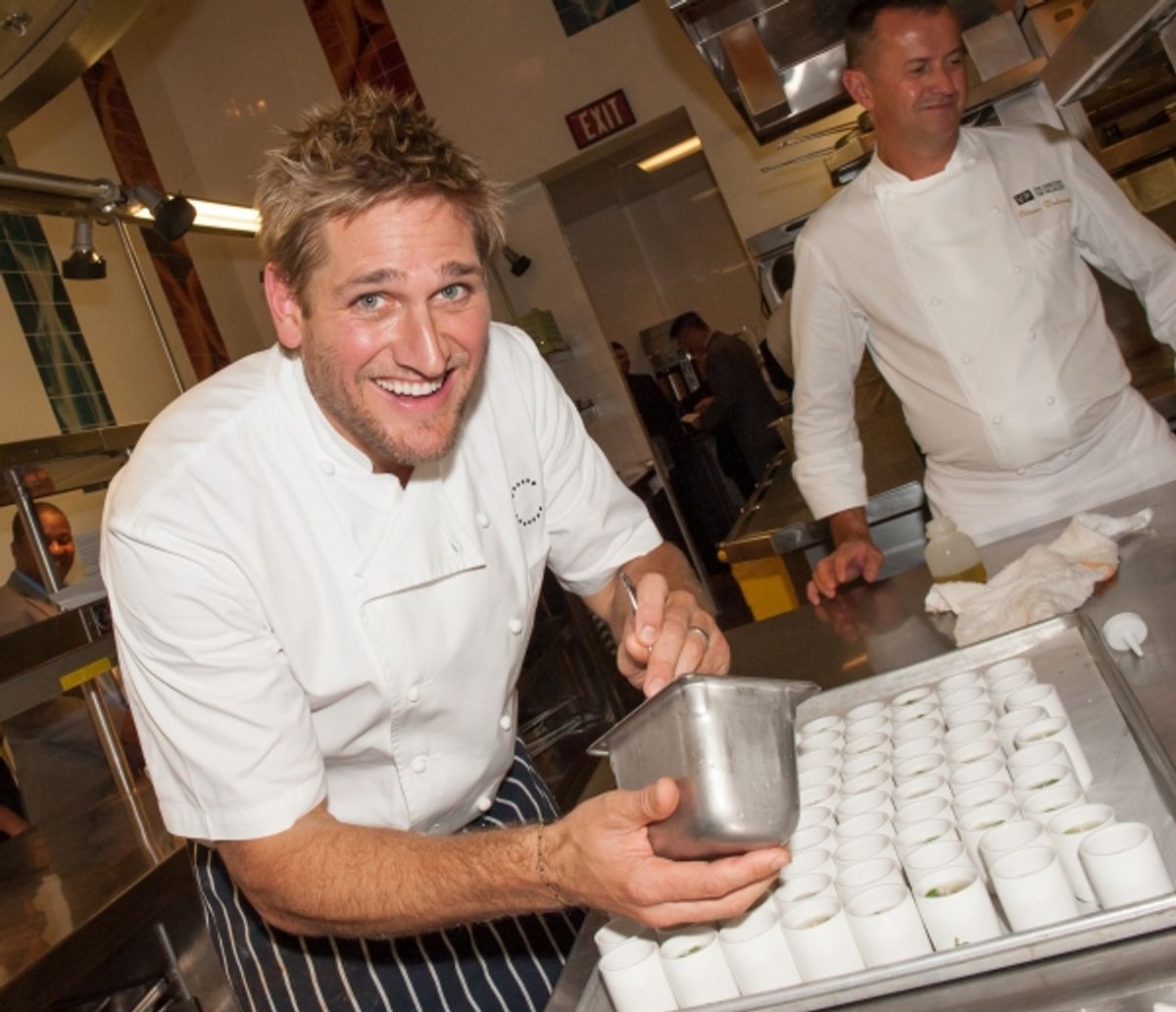 Curtis Stone cooking at 