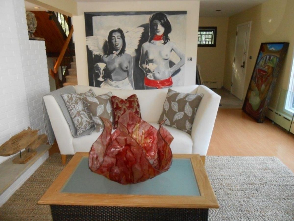 Painting by Kevin Berlin dominates living room at 