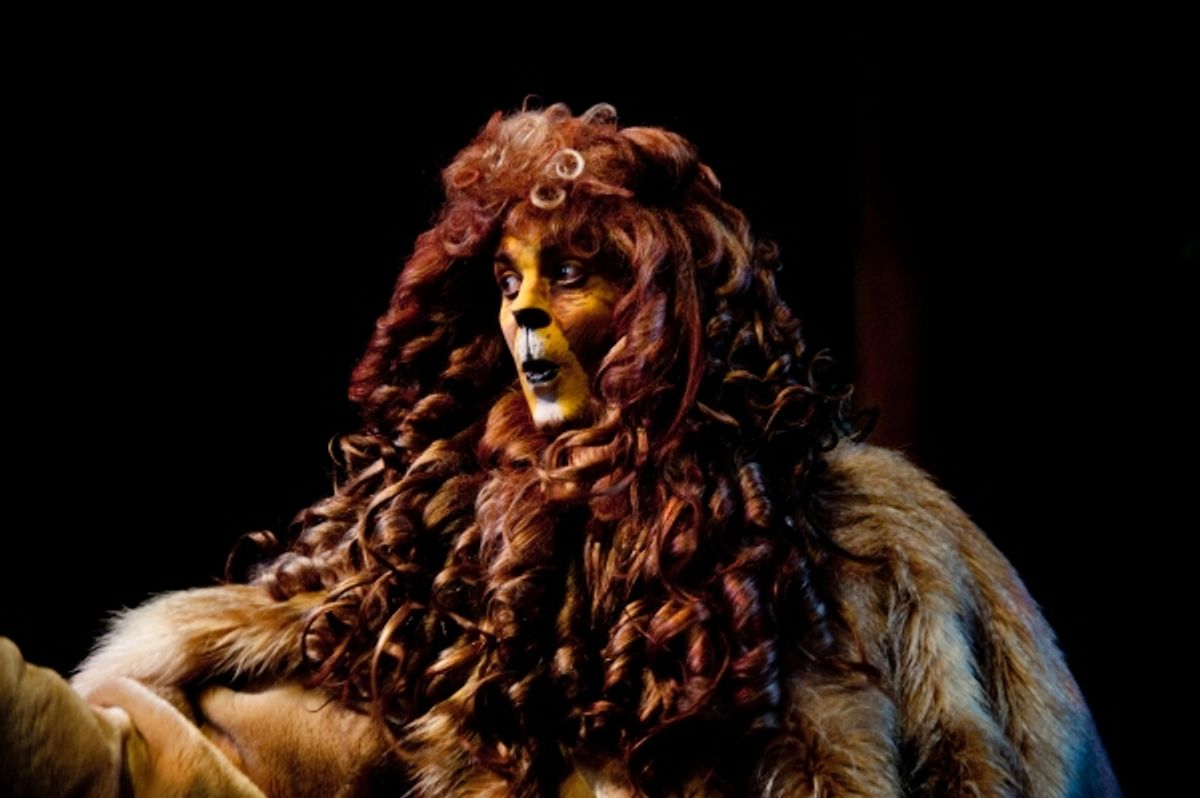 Seth Caikowski as The Cowardly Lion at 