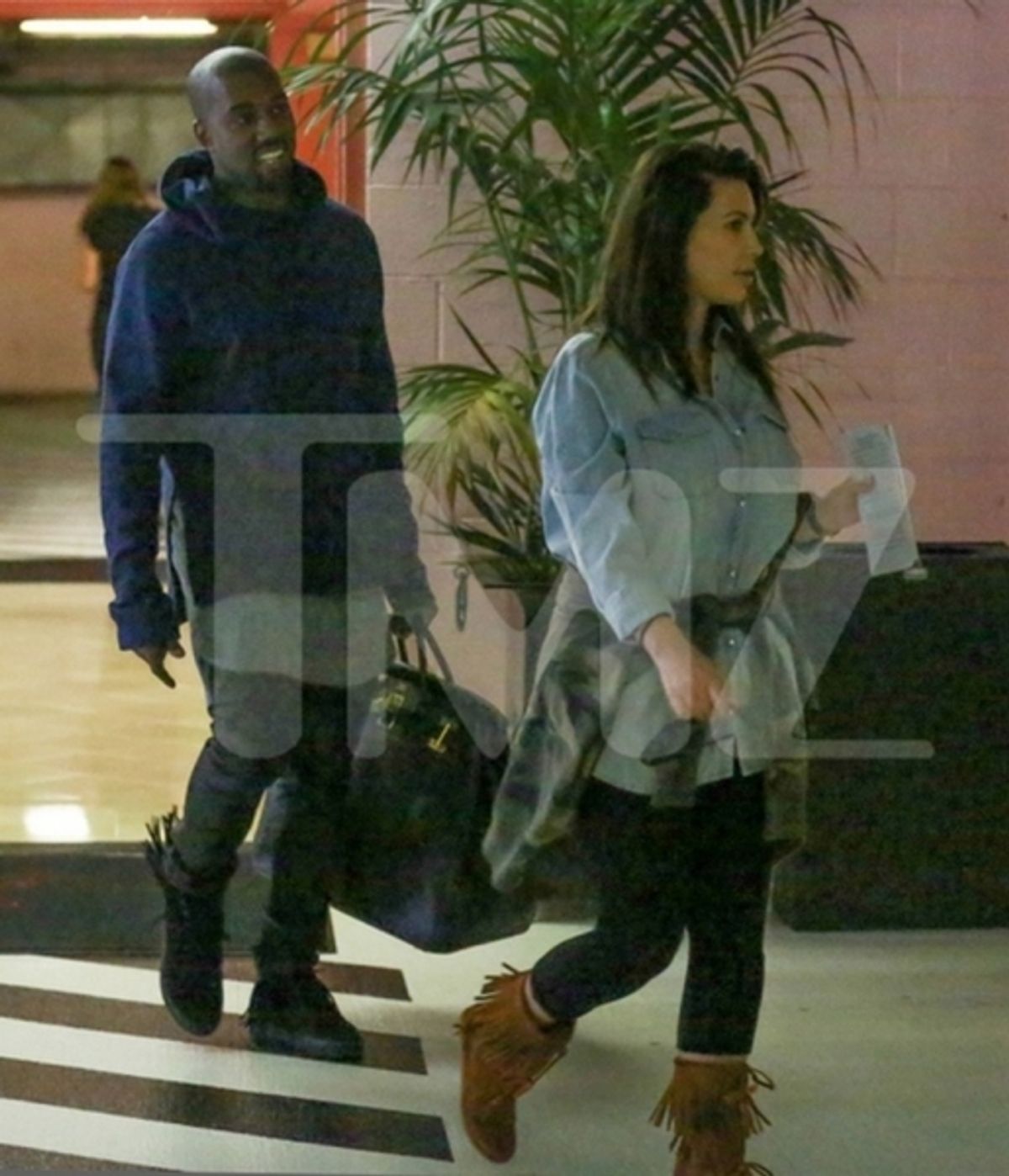 Kanye West and Kim Kardashian (Photo by TMZ) at 