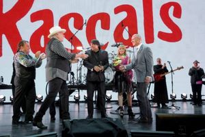 David Mirvish joins The Rascals on stage Photo