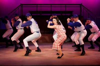 Maria Malanga (Gloria Thorpe) leads the ballplayers Photo