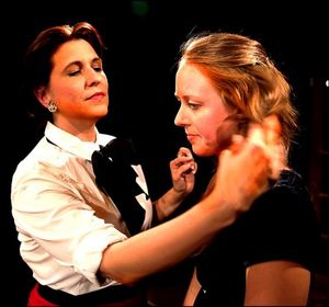 Myra (Melissa J. Mayo) fusses over Eleanor (Samantha Walker) encouraging her to go me Photo