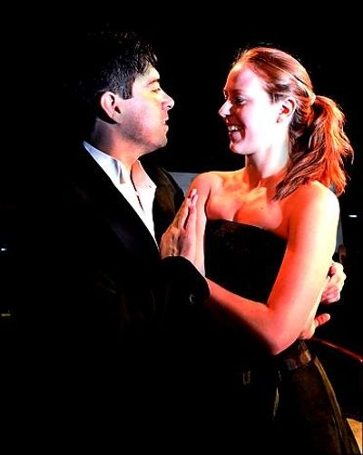 Barney (Scott McWhirter) tries to woo Eleanor (Samantha Walker) with his dancing.  Photo