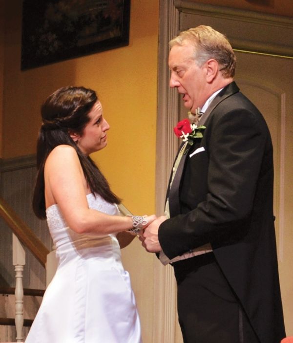 Stanley Banks (Jeff Stockberger) reassures his emotional daughter, Kay (Lisa Ermel),  Photo